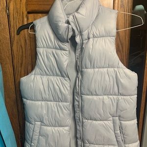 grey puffy vest